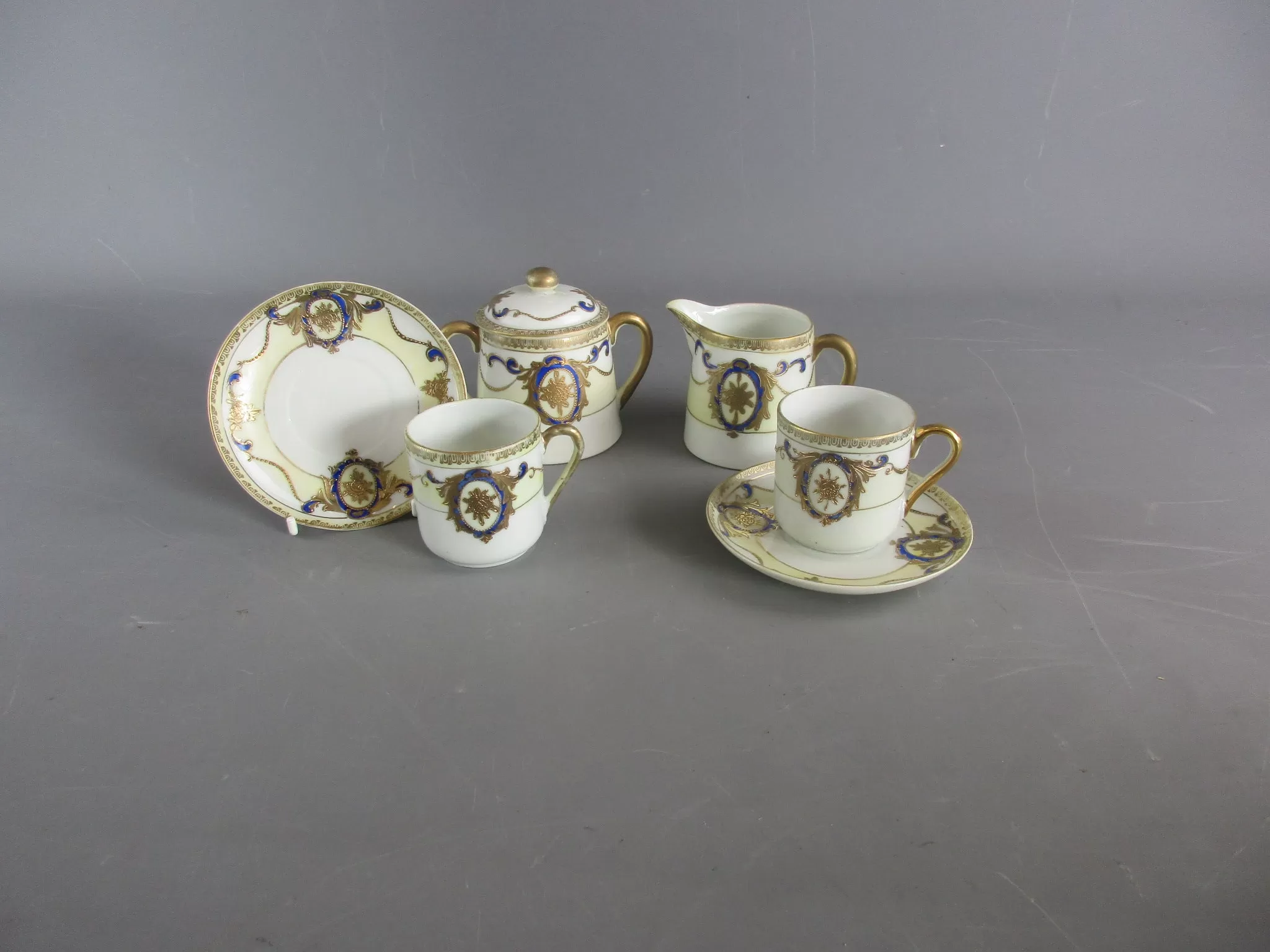 A Japanese Kinjo Bone China Cups, Saucers, Milk Jug & Sugar Bowl Set Vintage C early 20th Century